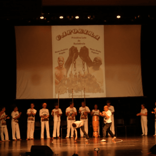 Banner do evento Atividade de Férias: CAPOEIRA DANÇADA - DO JOGO À COREOGRAFIA