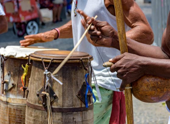 Banner do evento Atividade de férias:  A bateria da capoeira - Musicalidade 